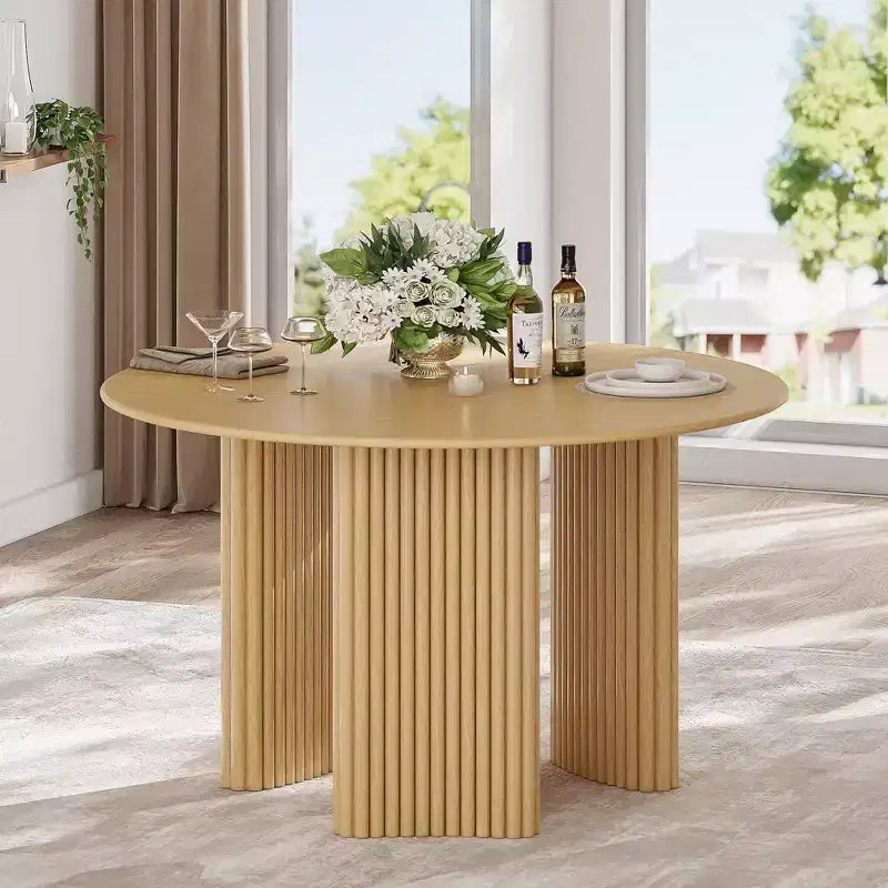 Tavolo da pranzo rotondo da 46" in legno massello per 4 persone, gambe a piedistallo scanalate, finitura naturale