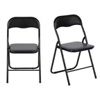 HomeRoots Set of Two Black Faux Leather and Steel Folding Chairs